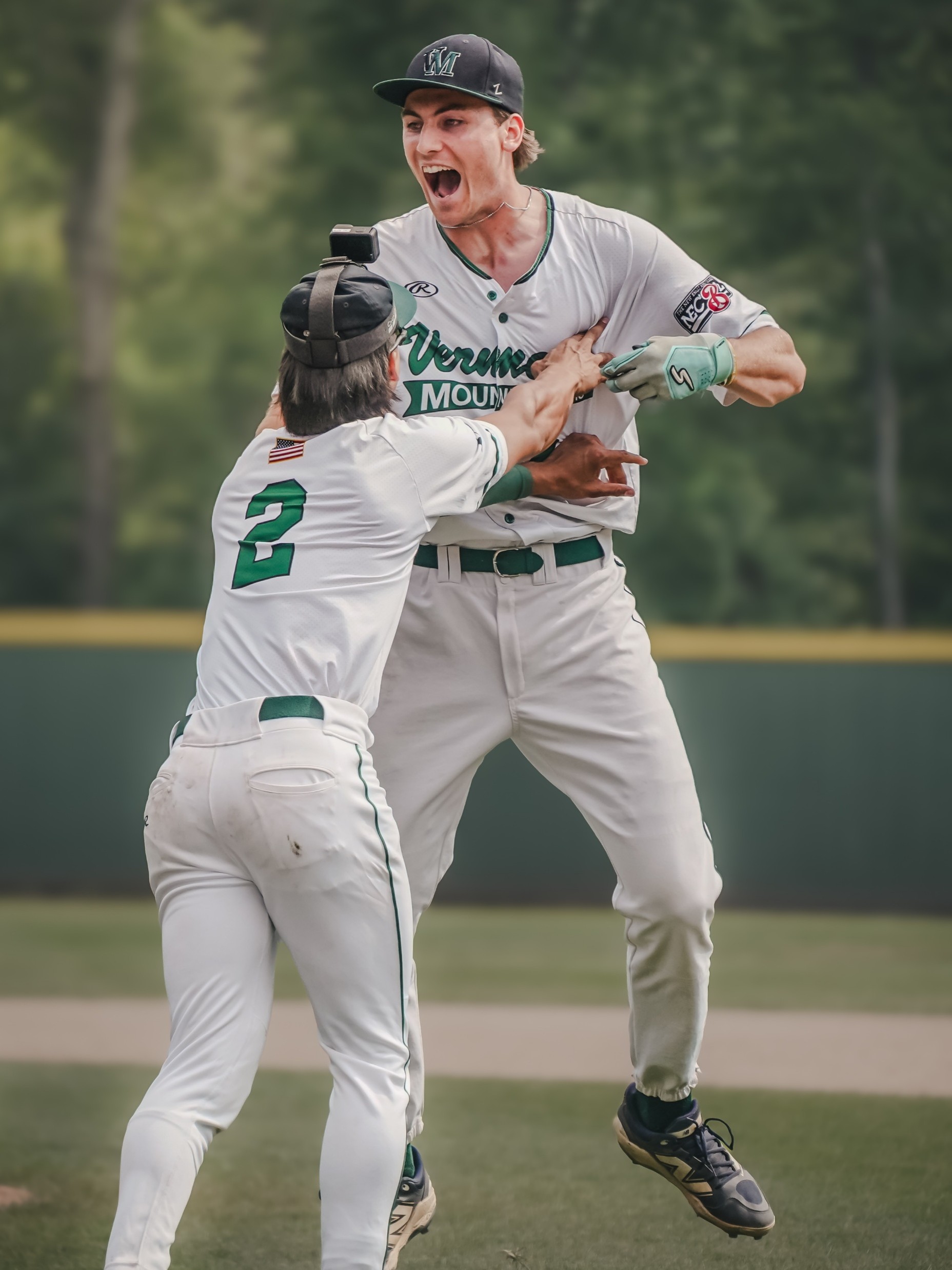 NECBL teammates celebrating during the home run derby